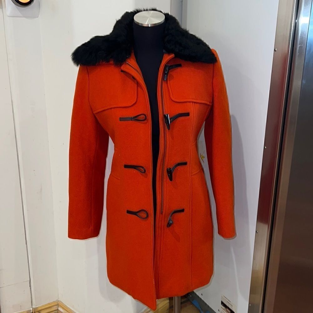 Orange with black fur heavy winter jacket size XS